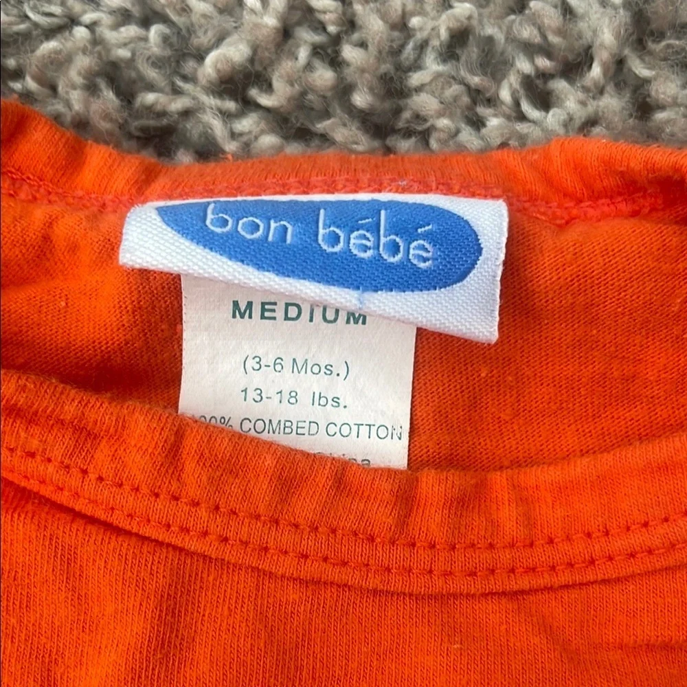 Bon Bebe Orange Onesie 3-6 month & Circo Orange/white Long Sleeve Skull Top